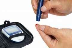 diabetic lance device in hand stock photo, by pat138241.jpg